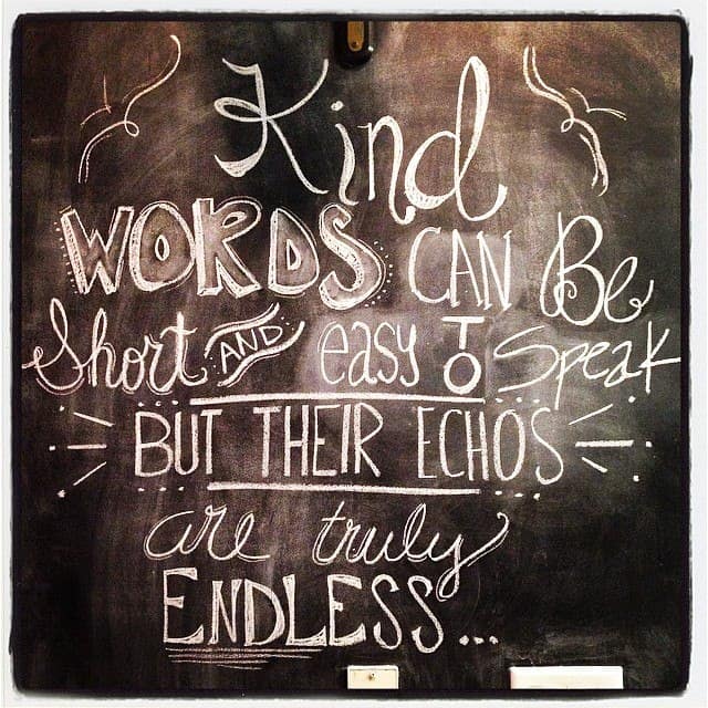 artistic text on a chalkboard wall that says, "kind words can be short and easy to speak but their echos are truly endless".