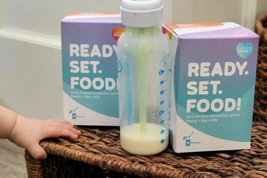 baby hand, bottle, & supplement - Preventing Childhood Food Allergies [With Ready, Set, Food!]