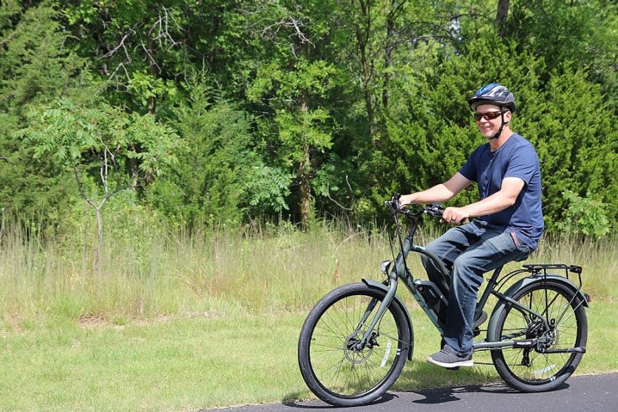 man on bike - Beginners Guide To Family Biking - iZip Simi Step Through Electric Bike