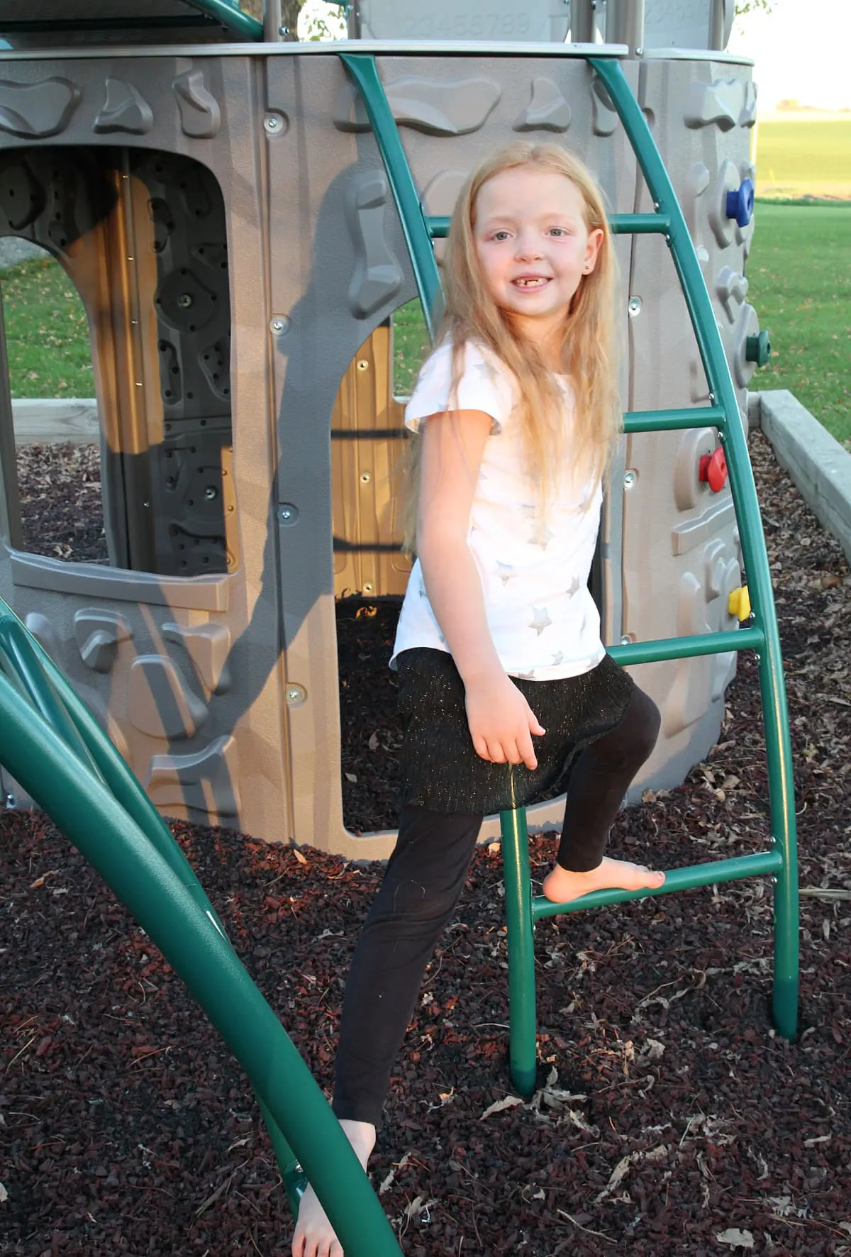 girl on playground - Lifetime Double Adventure Tower Playset Review