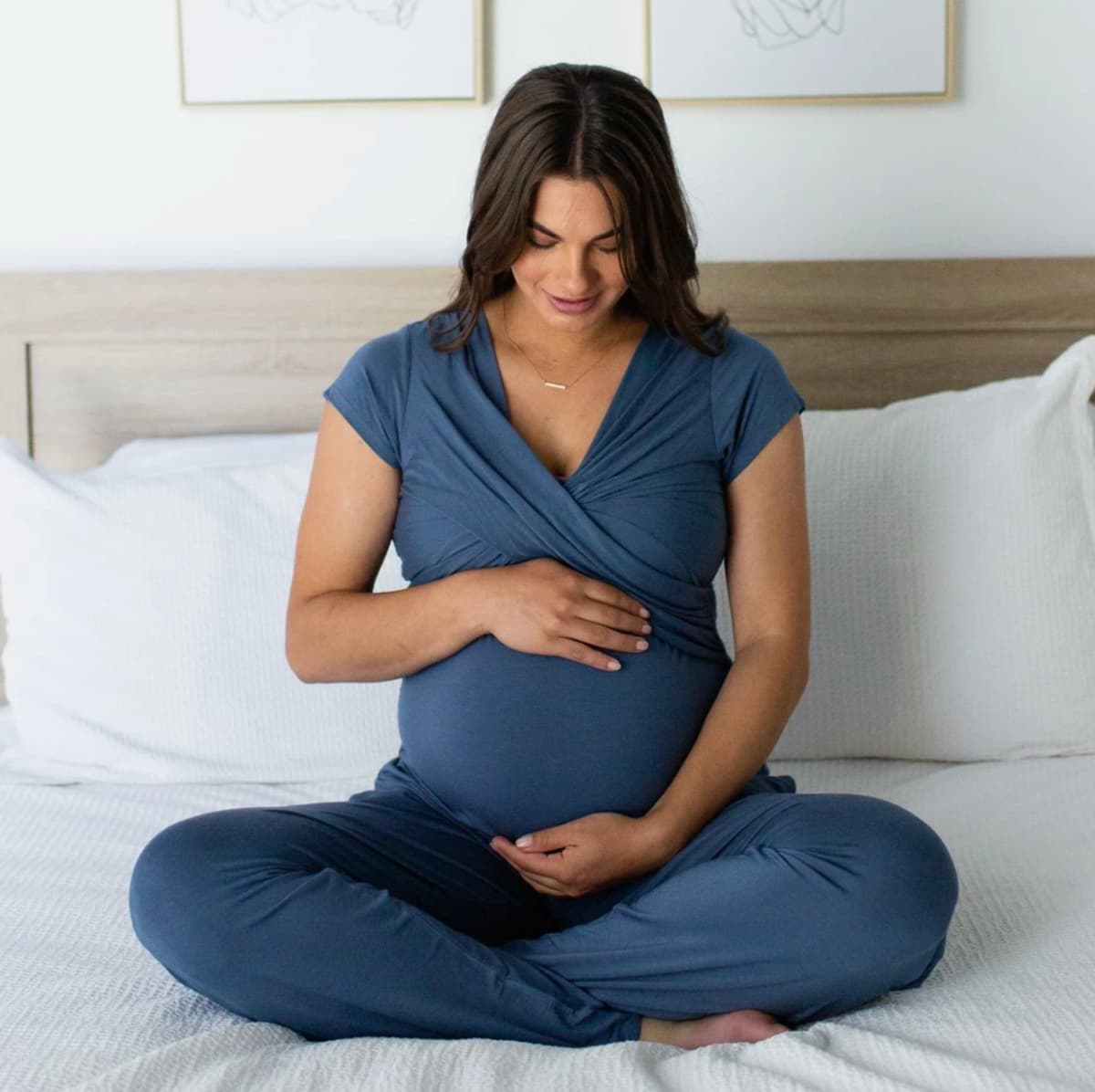 pregnant mom sitting on bed.  Davy Nursing & Maternity Pajama Set