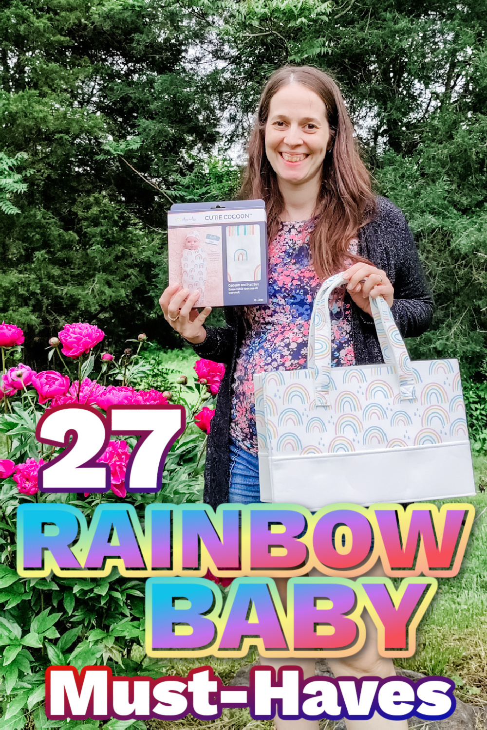 Mom holding rainbow themed baby items.