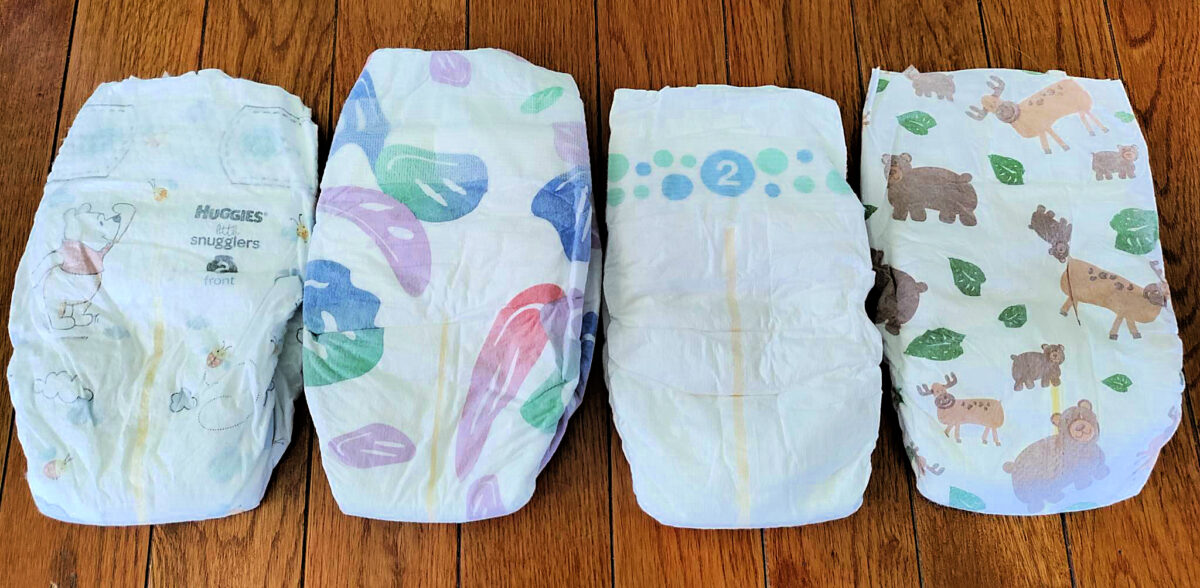 A variety of size 2 diapers. From left to right: Huggies Little Snugglers, Freestyle Diapers, Target brand diapers, and Nature's Promise (Martin's/Giant brand of chlorine-free diapers). 