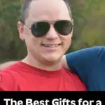 man in a red shirt and sunglasses with a text overlay that says "The Best Gifts for a manly man"