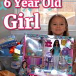 little girl with Barbies and a text overlay that says "Best gifts for a 6 year old girl"