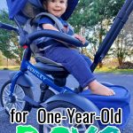 a little boy in a stroller trike with a text overlay that says "the coolest gifts for 1 year old boys"